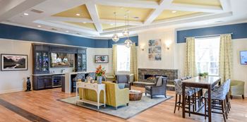 Clubhouse with couch at Siena Luxury Residences, Cinnaminson